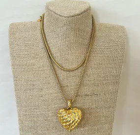 Anne Klein signed 80s gold tone necklace with large strawberry style shaped heart pendant.